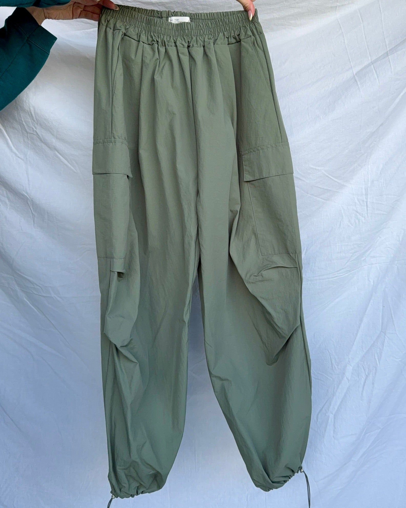 Green parachute pants